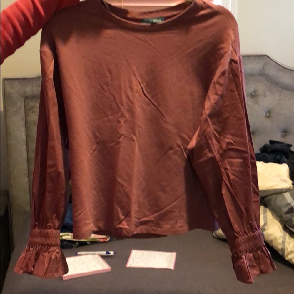 Ruffled blouse never worn